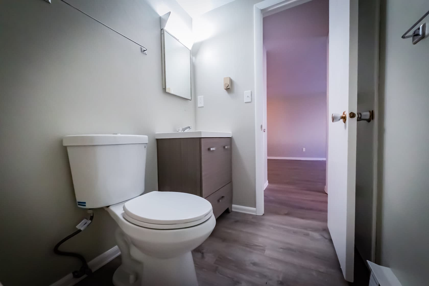 Clean, bright renovated apartment bathroom